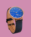 Golden Watch with Blue Stone Face